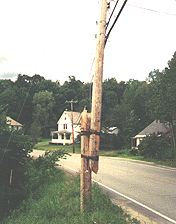 Phone pole on entering a small town.