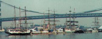 Tall ships at the Ben Franklin Bridge.
